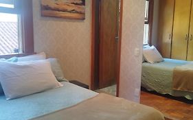 Quarto Suite -Em apartamento familiar